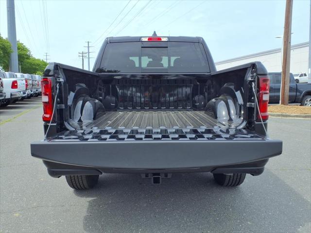 Photo of 2025 Diamond Black Crystal Pearlcoat RAM 1500