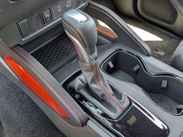 Photo of 2025 Cardinal Red Metallic Tricoat Nissan Frontier