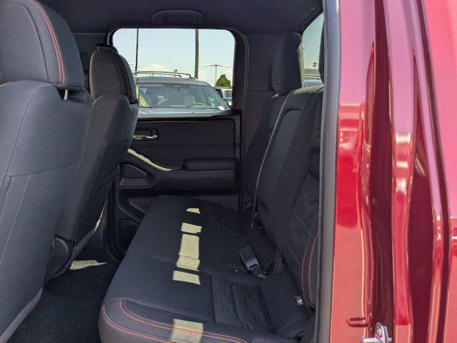Photo of 2025 Cardinal Red Metallic Tricoat Nissan Frontier