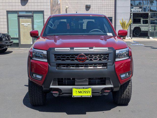 Photo of 2025 Cardinal Red Metallic Tricoat Nissan Frontier