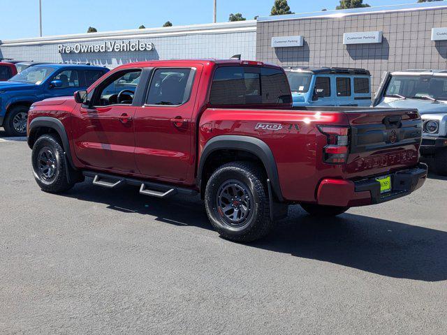 Photo of 2025 Cardinal Red Metallic Tricoat Nissan Frontier