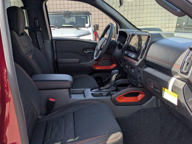 Photo of 2025 Cardinal Red Metallic Tricoat Nissan Frontier