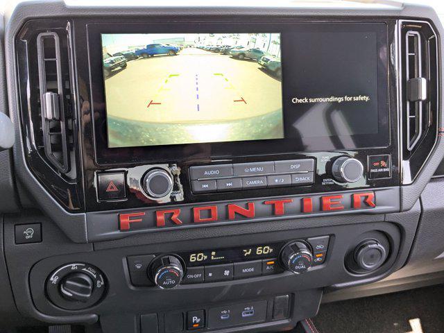 Photo of 2025 Cardinal Red Metallic Tricoat Nissan Frontier