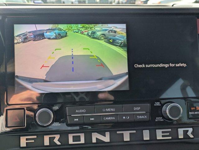 Photo of 2025 Glacier White Nissan Frontier