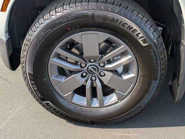 Photo of 2025 Glacier White Nissan Frontier