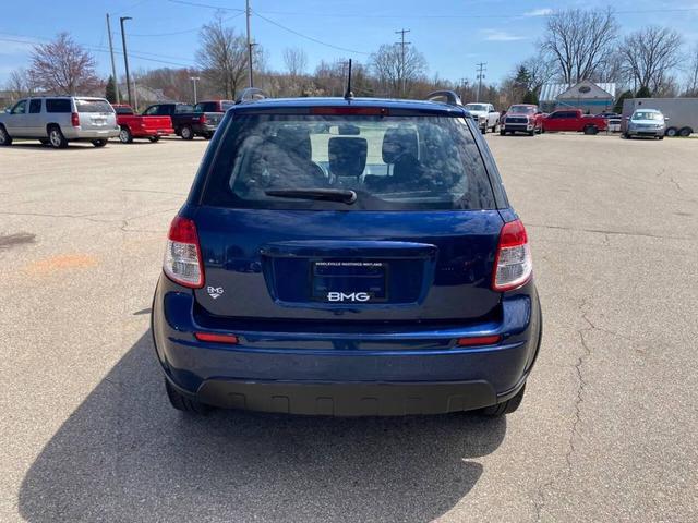 Photo of 2010 Deep Sea Blue Metallic Suzuki SX4