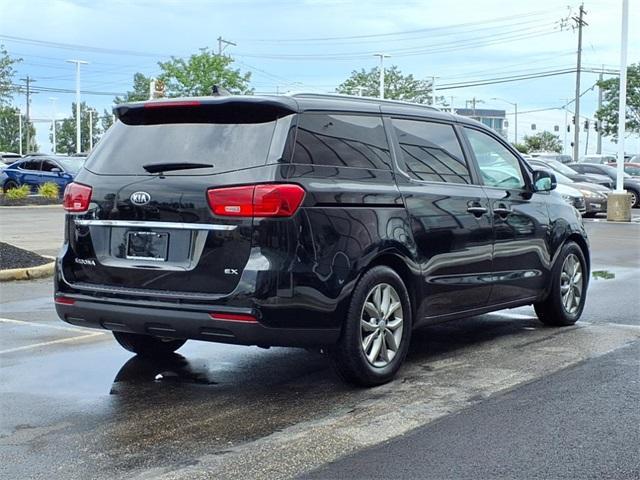 Photo of 2021 Aurora Black Kia Sedona