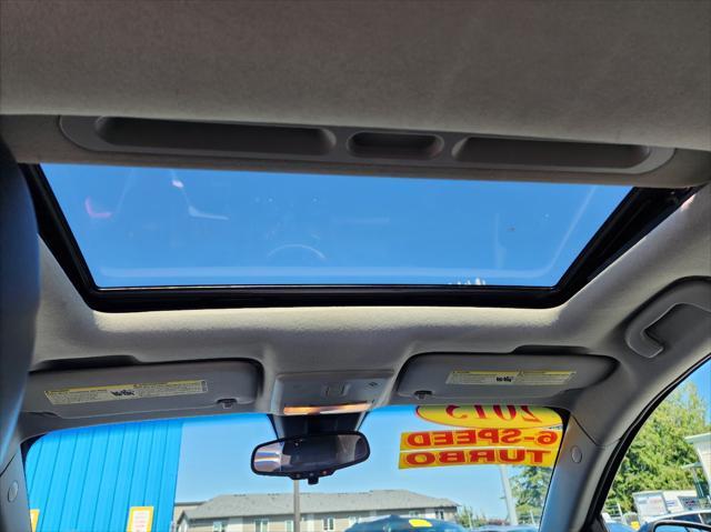 Photo of 2013 Black Granite Metallic Chevrolet Sonic