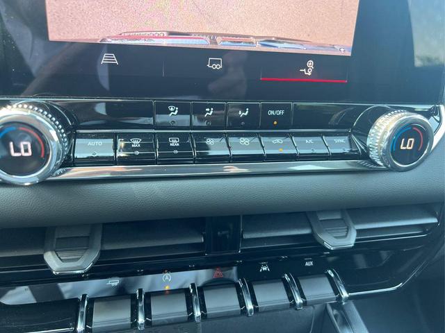 Photo of 2024 Deep Bronze Metallic GMC Canyon