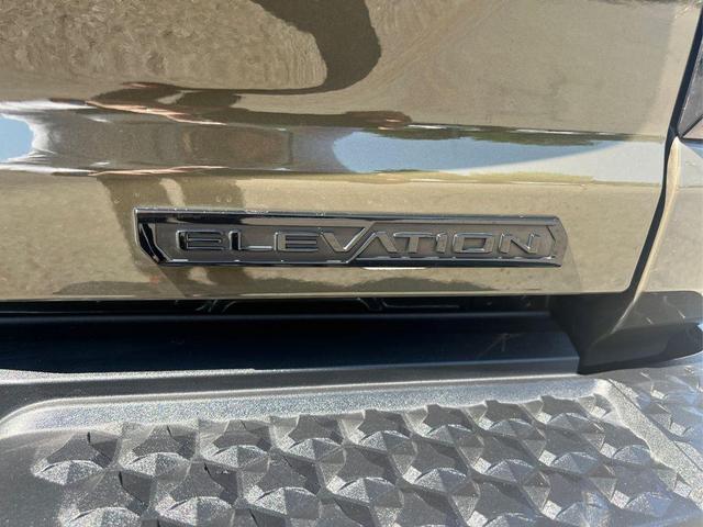 Photo of 2024 Deep Bronze Metallic GMC Canyon