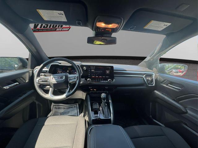 Photo of 2024 Deep Bronze Metallic GMC Canyon