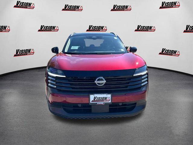 Photo of 2025 Scarlet Ember Tintcoat/Super Black Nissan Kicks