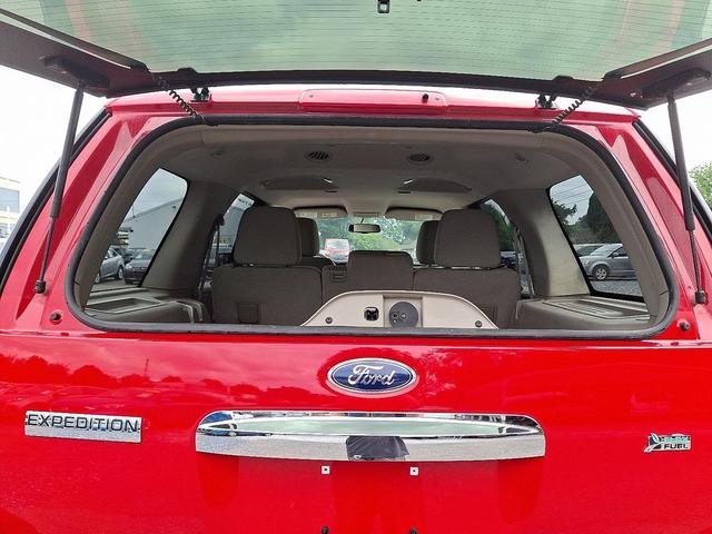 Photo of 2014 Ruby Red Metallic Tinted Clearcoat Ford Expedition