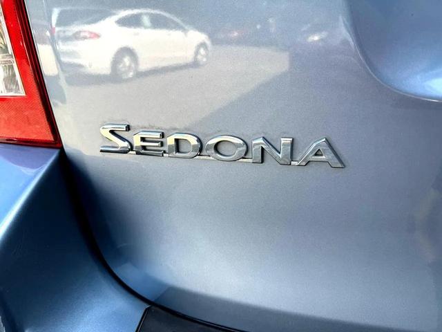 Photo of 2012 Glacier Blue Kia Sedona