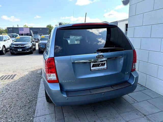 Photo of 2012 Glacier Blue Kia Sedona