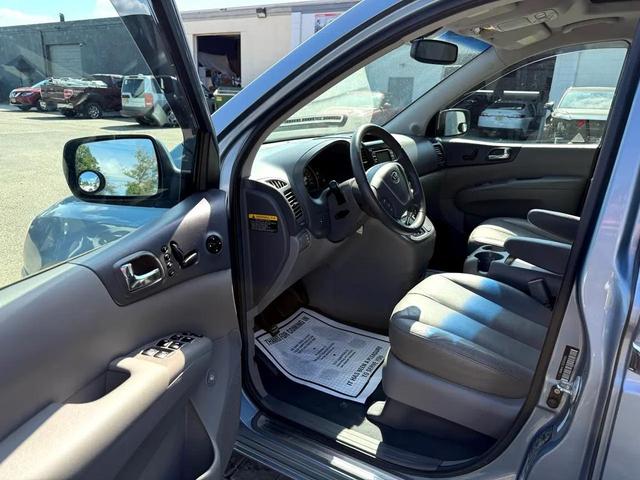 Photo of 2012 Glacier Blue Kia Sedona
