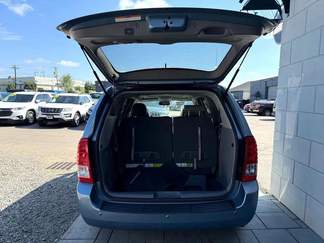 Photo of 2012 Glacier Blue Kia Sedona