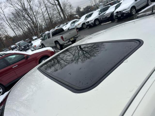 Photo of 2006 White Gold Flash Tricoat Buick Lucerne
