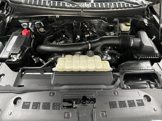 Photo of 2023 Chroma Caviar Dark Gray Metallic Clearcoat Lincoln Navigator