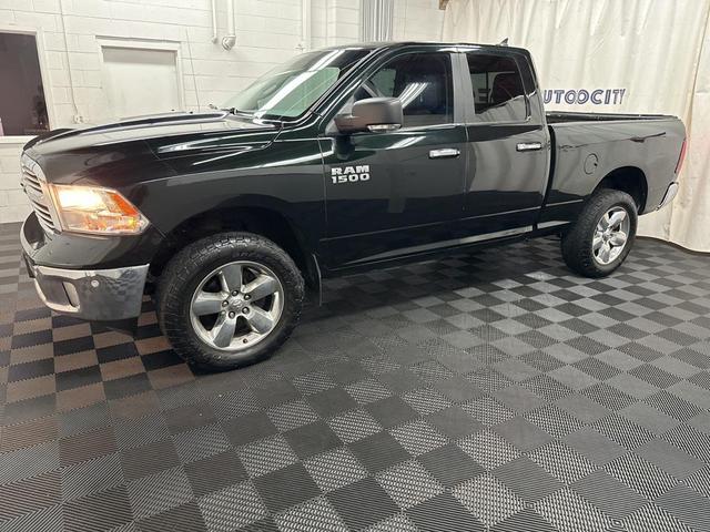 Photo of 2015 Black Forest Green Pearlcoat RAM 1500