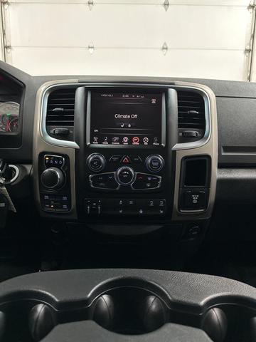Photo of 2015 Black Forest Green Pearlcoat RAM 1500