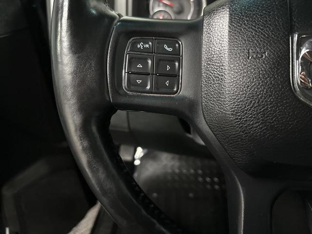 Photo of 2015 Black Forest Green Pearlcoat RAM 1500