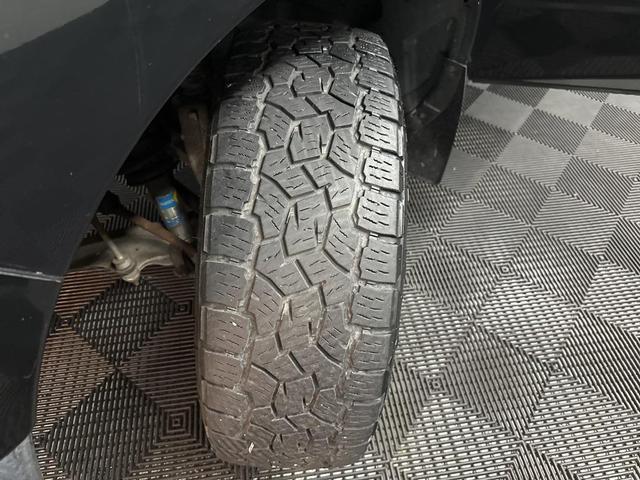 Photo of 2015 Black Forest Green Pearlcoat RAM 1500