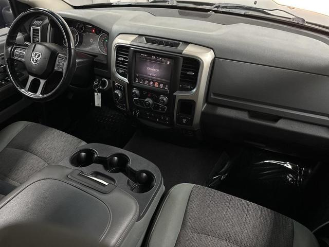 Photo of 2015 Black Forest Green Pearlcoat RAM 1500