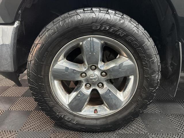 Photo of 2015 Black Forest Green Pearlcoat RAM 1500