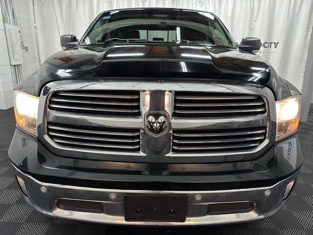 Photo of 2015 Black Forest Green Pearlcoat RAM 1500