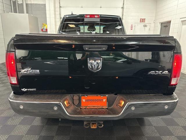 Photo of 2015 Black Forest Green Pearlcoat RAM 1500