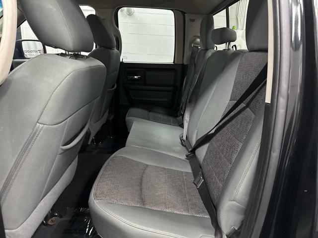 Photo of 2015 Black Forest Green Pearlcoat RAM 1500