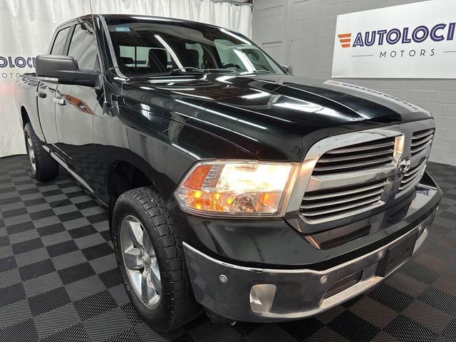 Photo of 2015 Black Forest Green Pearlcoat RAM 1500