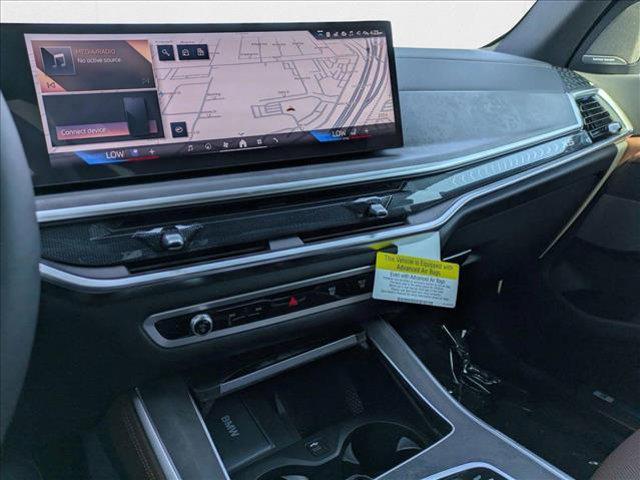 Photo of 2026 Manhattan Green Metallic BMW X5 PHEV