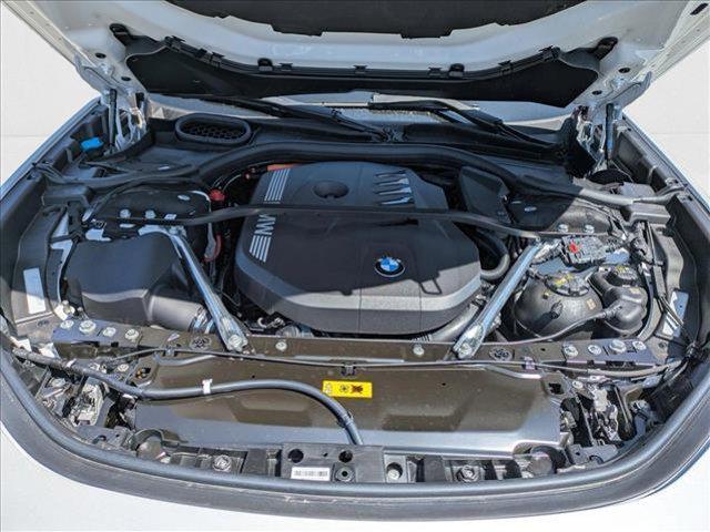 Photo of 2025 Mineral White Metallic BMW 750e
