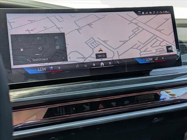 Photo of 2025 Mineral White Metallic BMW 750e