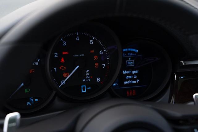 Photo of 2025 Copper Ruby Metallic Porsche Macan