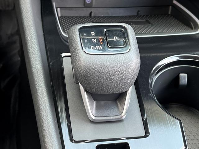 Photo of 2025 Baja Storm Metallic/Super Black Nissan Rogue