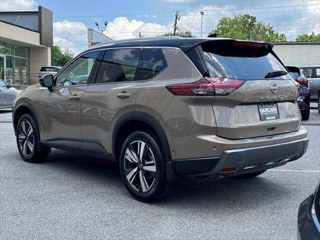 Photo of 2025 Baja Storm Metallic/Super Black Nissan Rogue