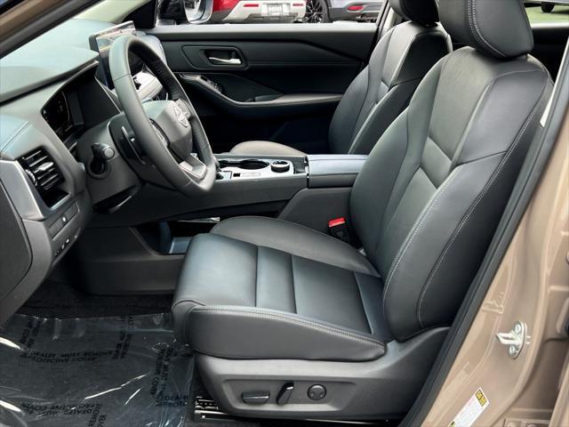 Photo of 2025 Baja Storm Metallic/Super Black Nissan Rogue