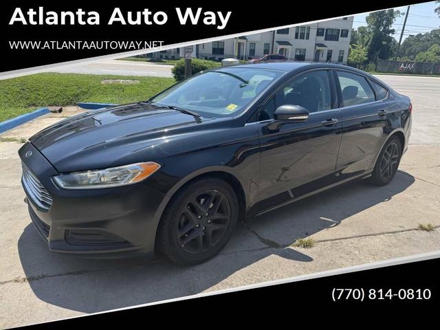 Photo of 2013 Tuxedo Black Metallic Ford Fusion