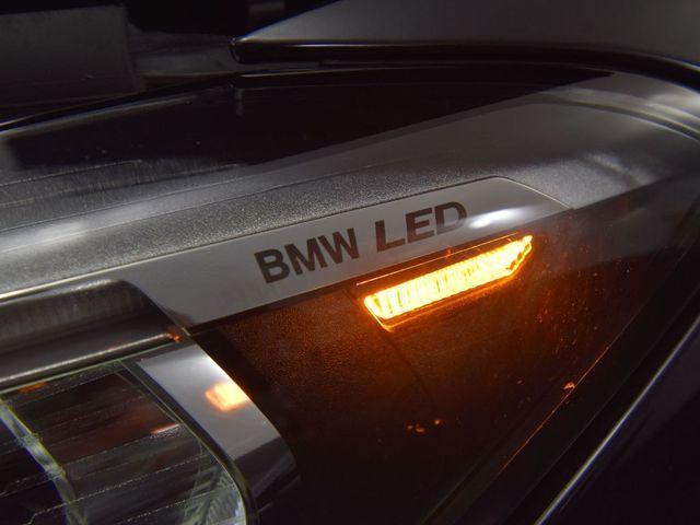 Photo of 2022 Black Sapphire Metallic BMW 750