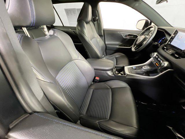 Photo of 2021 Blizzard Pearl/Midnight Black Metallic Toyota RAV4 Hybrid