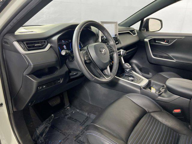 Photo of 2021 Blizzard Pearl/Midnight Black Metallic Toyota RAV4 Hybrid