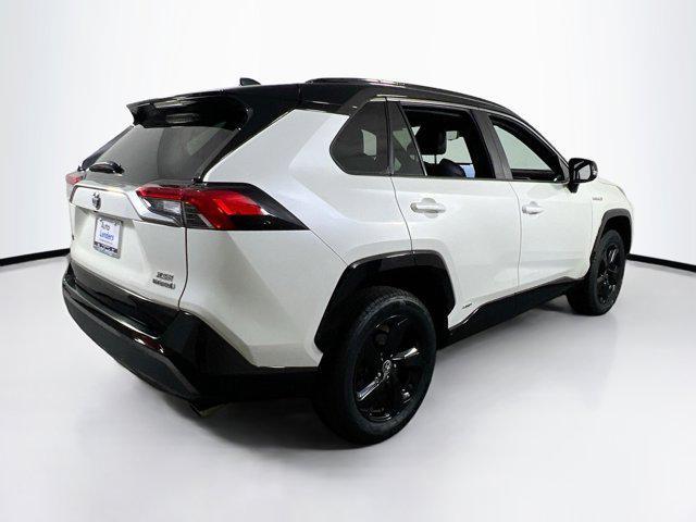 Photo of 2021 Blizzard Pearl/Midnight Black Metallic Toyota RAV4 Hybrid