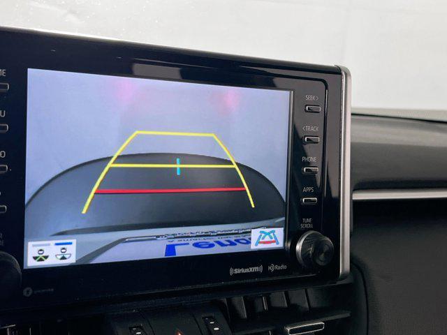 Photo of 2021 Blizzard Pearl/Midnight Black Metallic Toyota RAV4 Hybrid