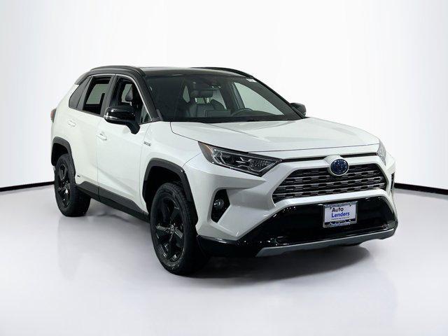 Photo of 2021 Blizzard Pearl/Midnight Black Metallic Toyota RAV4 Hybrid