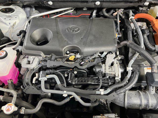 Photo of 2021 Blizzard Pearl/Midnight Black Metallic Toyota RAV4 Hybrid