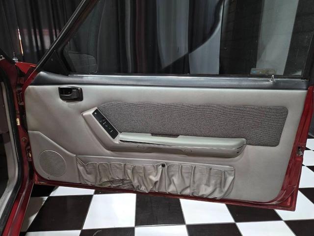 Photo of 1990 Red Ford Mustang