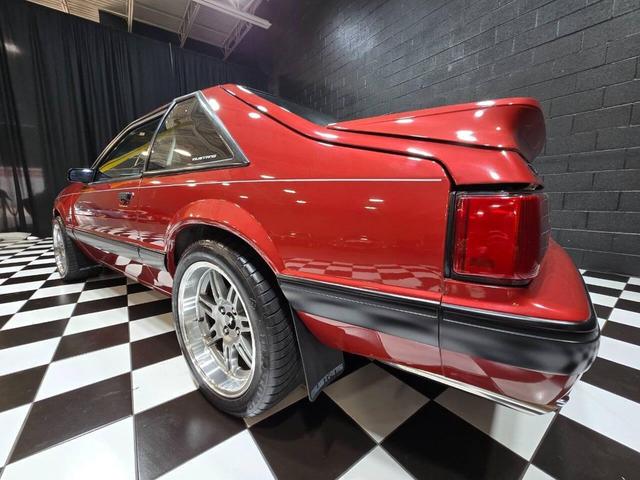Photo of 1990 Red Ford Mustang